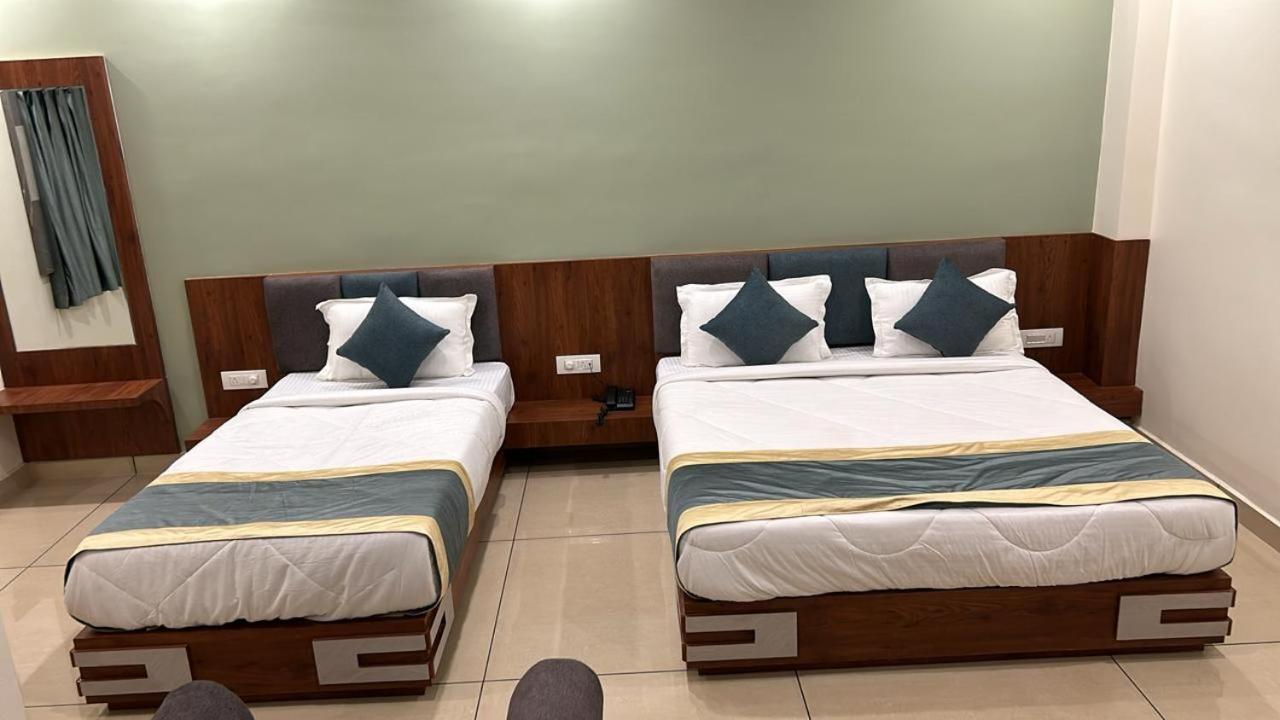 Hotel Omkareshwar Inn Диогар Екстериор снимка